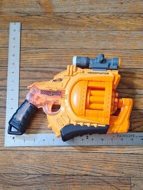 Nerf Doomlands Negotiator Orange Toy Blaster with Gray Scope
